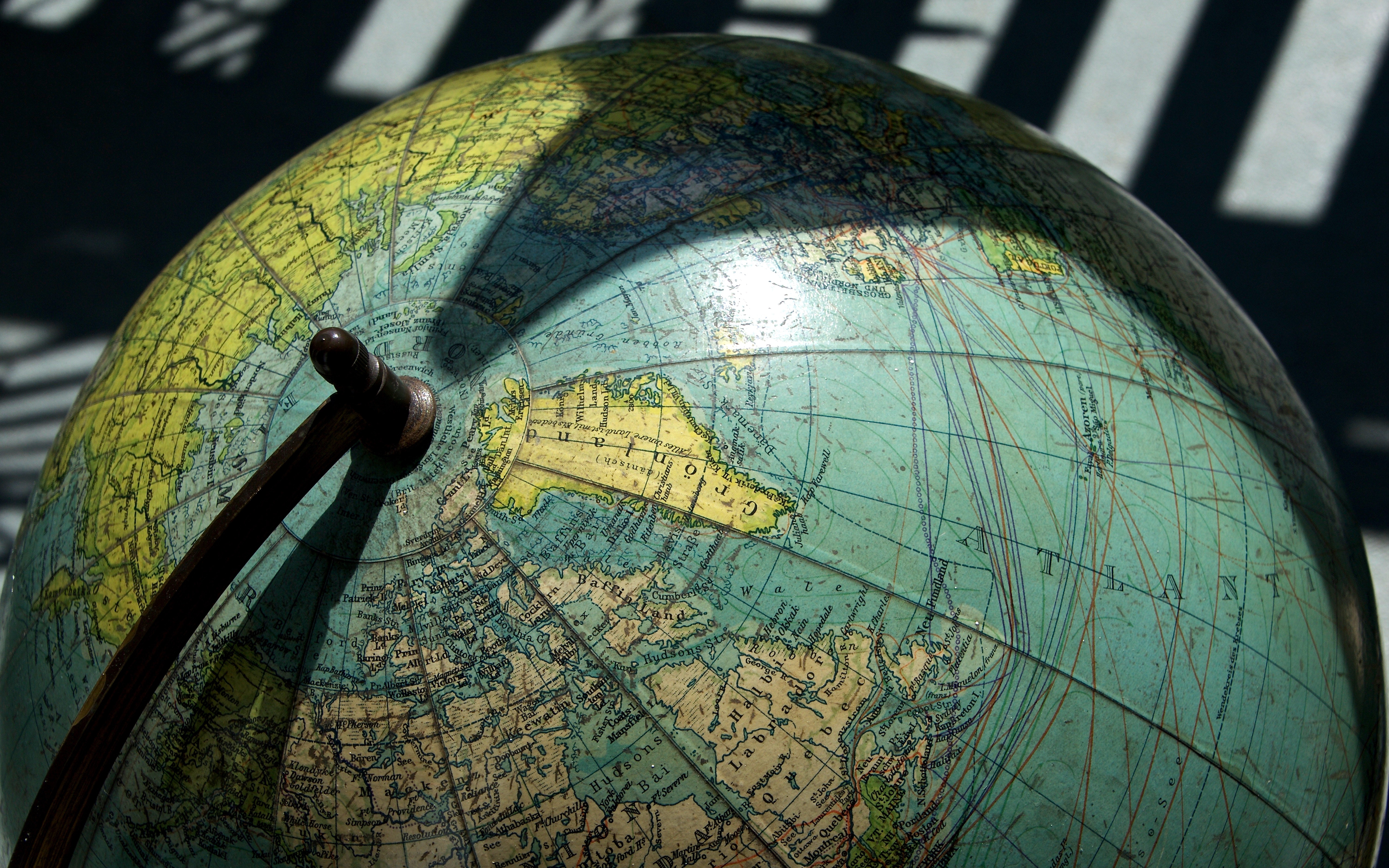 Earth globe with shadows and light on the surface.