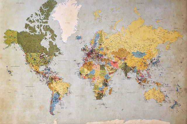 A physical world map utilizing a small map scale.