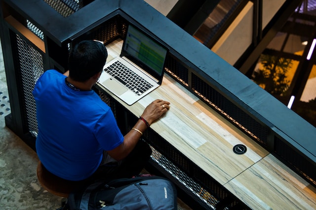  A man checking out valuable features on Excel to improve his work productivity.
