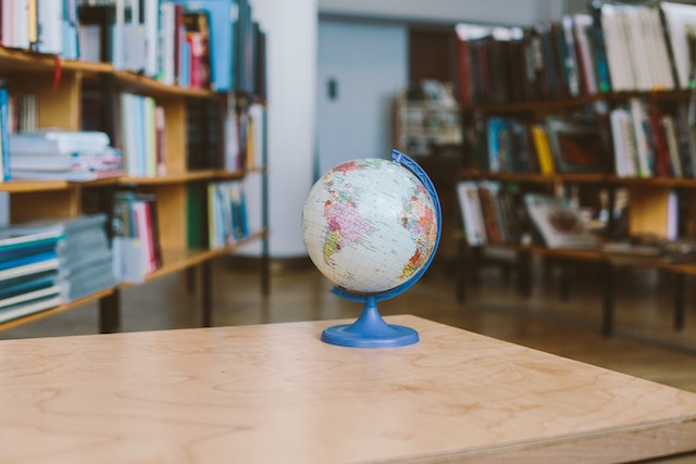 A perfectly crafted globe on display in a school library.