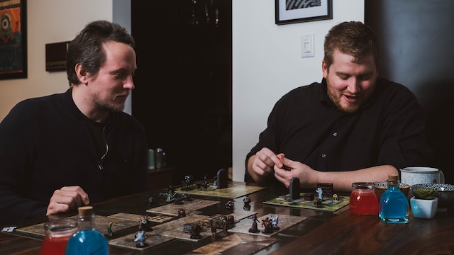 Two players enjoy a game of Dungeons and Dragons. 