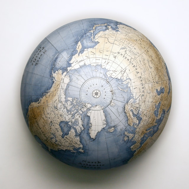 A globe showing latitudes and longitudes near the Arctic Circle.