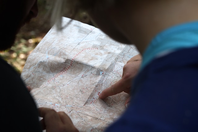 A drone pilot looks at a section map to identify restricted airspace.