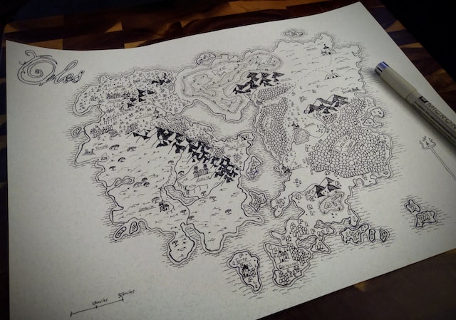 A dungeon master prints a fantasy map after creating it with an online tool.